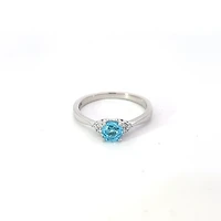 10K White Gold Blue Topaz and 0.06cttw Diamond Ring - 6