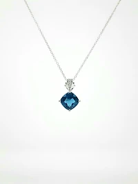 Blue Topaz and Diamond Pendant