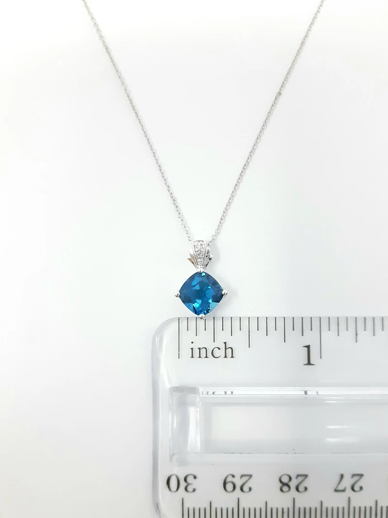 Blue Topaz and Diamond Pendant