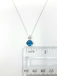Blue Topaz and Diamond Pendant