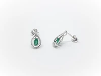10K White Gold Oval Cut Emerald Stud Earrings