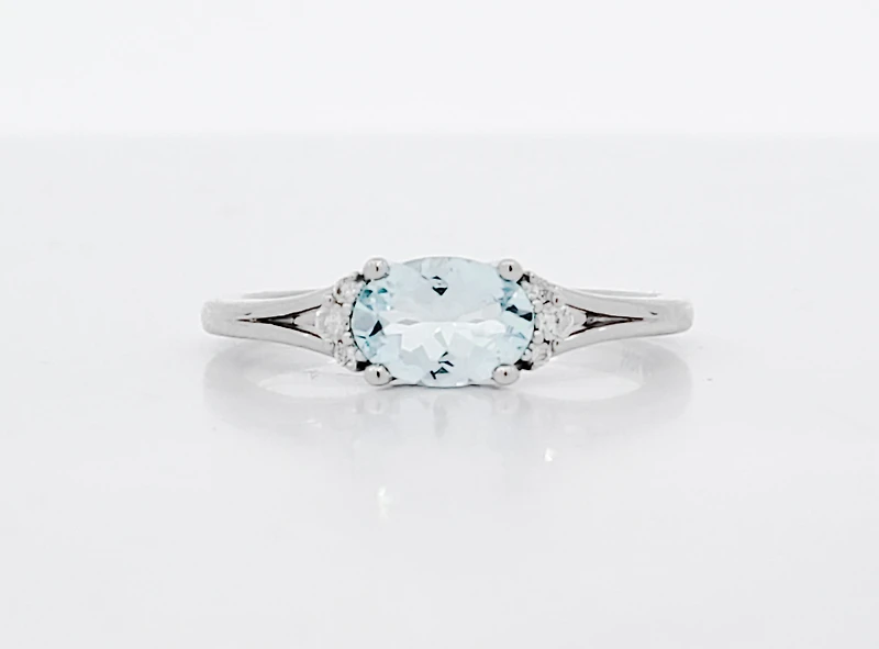 10K White Gold 5x7mm Oval Cut Aquamarine and 0.05cttw Diamond Ring, size 7