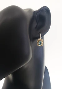 10K Yellow Gold 6x4mm Oval Cut Swiss Blue Topaz and 0.045cttw Diamond Dangle Earrings