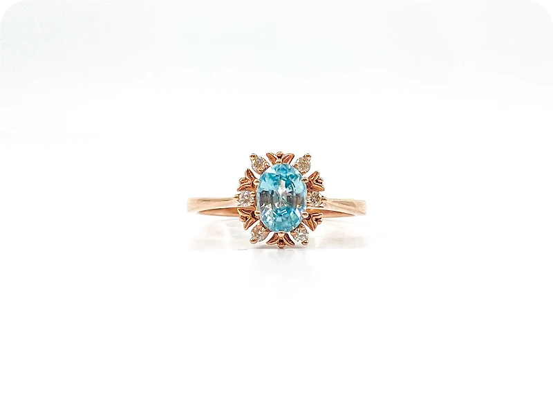 10K Rose Gold 1.20cttw Genuine Oval Cut Blue Zircon and 0.09cttw Diamond Halo Ring, size 7