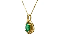 10K Yellow Gold 6x4mm Emerald and 0.03cttw Diamond Pendant, 18"