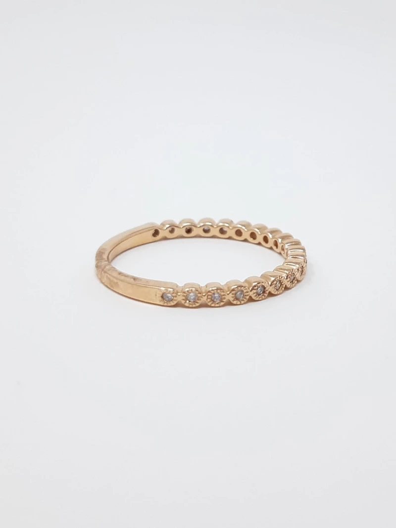 10K Rose Gold 0.10cttw Diamond Ring, size 6.5