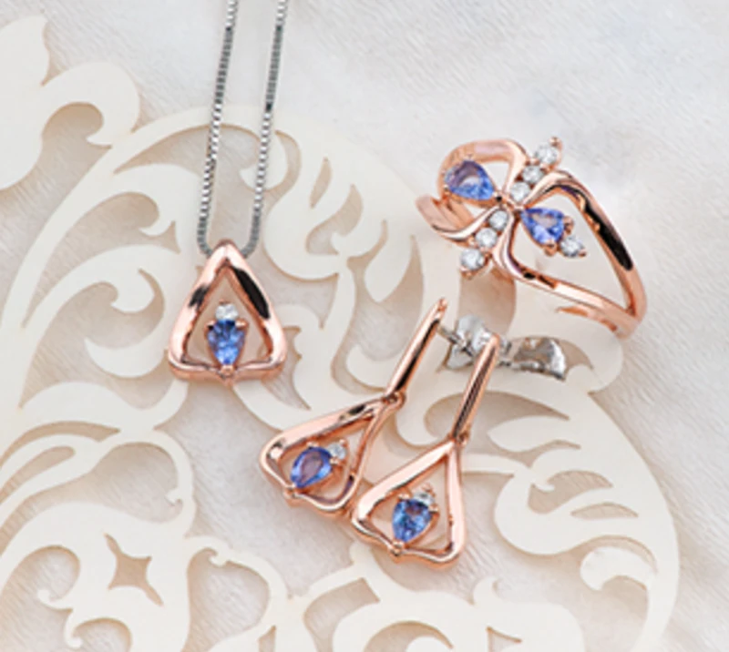 14K Rose Gold Genuine Pear Shape Tanzanite and 0.18cttw Canadian Diamond Ring, 6.5