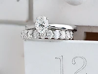 18K White Gold & Palladium Alloy (hypoallergenic) 0.73cttw Oval Shape Canadian Diamond Engagement Ring