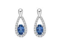 10K White Gold 6x4mm Oval Cut London Blue Topaz and 0.14cttw Diamond Earrings