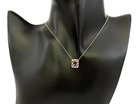 10K Yellow Gold 7x5mm Oval Cut Created Alexandrite and 0.03cttw Diamond Necklace - 18 Inches