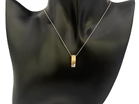 10K Two-Tone Reversible 0.08cttw Diamond Pendant, 18"