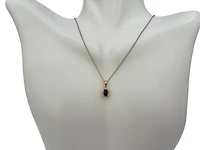 10K Yellow Gold 6x4mm Emerald Cut Sapphire and 0.04cttw Diamond Pendant, 18"