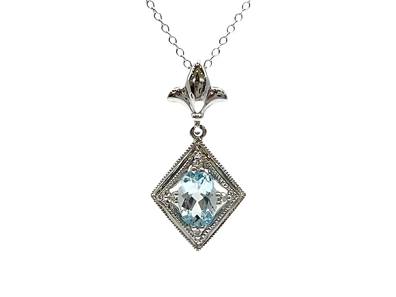 10K White Gold 6x4mm Oval Cut Sky Blue Topaz and 0.021cttw Diamond Necklace - 18 Inches