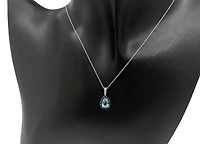 10K White Gold 7x5mm Pear Cut Sky Blue Topaz with Blue Sapphire Halo and 0.03cttw Diamond Necklace - 18 Inches