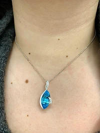 Blue Topaz and Diamond Pendant