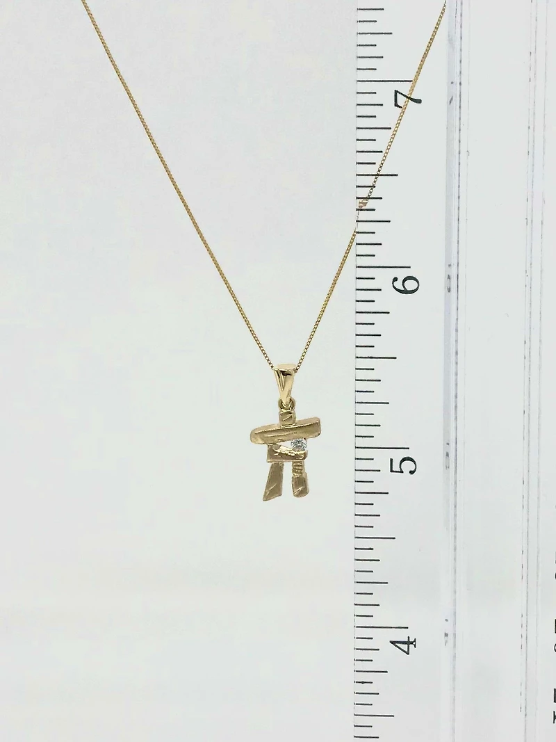 10K Yellow Gold 0.054cttw Diamond Inukshuk Pendant, 18"
