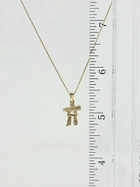 10K Yellow Gold 0.054cttw Diamond Inukshuk Pendant, 18"