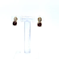 10K White & Yellow Gold Garnet and 0.025cttw Diamond Ring
