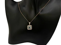 10K Rose Gold 8mm Cushion Cut Blue Topaz and 0.063cttw Diamond Pendant, 18"