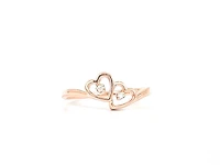 10K Rose Gold 0.01cttw Round Cut Diamond Ring, size 5.75 - 4.5