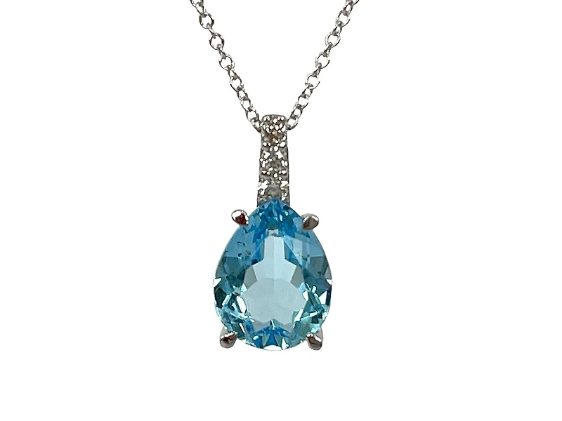 10K White Gold 9x7mm Pear Cut Swiss Blue Topaz and 0.059cttw Diamond Necklace - 18 Inches