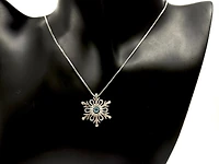 925 Sterling Silver 3.5mm Blue Topaz and 0.018cttw Diamond Snowflake Pulse Pendant - 18"