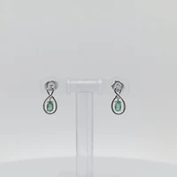 10K White Gold Oval Cut Emerald Stud Earrings