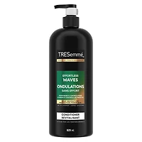 Revitalisant pour des cheveux hydratés et sans frisottis TRESemmé Effortless Waves + Oléo-Essence de Jojoba avec Technologie Pro Style™ 828 ml