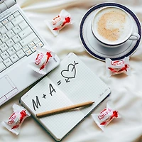 Sachet de spécialités à la noix de coco et à l’amande CONFETTERIA RAFFAELLO, 8 confiseries emballées individuellement