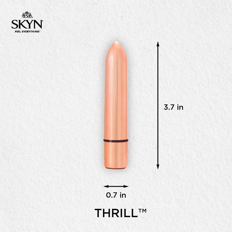 Masseur personnel Thrill de SKYN - Masseur vibrant compact et discret - Plaqué or rose - Rechargeable, résistant à l'eau et sans latex, 3 vitesses allant de douces à intenses.
