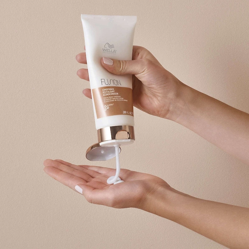 Après-shampooing Fusion Réparation Intense de Wella Professionals pour cheveux abîmés – revitalisant professionnel pour la réparation des cheveux, anti-casse, 200 mL
