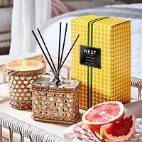 Bougie classique en rotin au pamplemousse