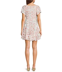 Angie Floral Printed Short Flutter Sleeve V-Neck Smocked Tiered Mini Dress
