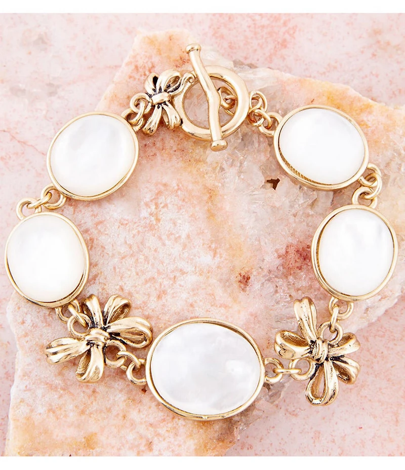 Barse Gifted White Mother of Pearl Golden Bow Link Bracelet