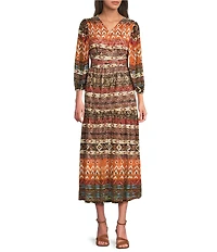 Calessa Border Abstract Print V-Neck Long Sleeve Tiered Midi Dress