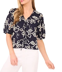 CeCe V-Neck Short Puff Sleeve Embroidered Tie Front Top