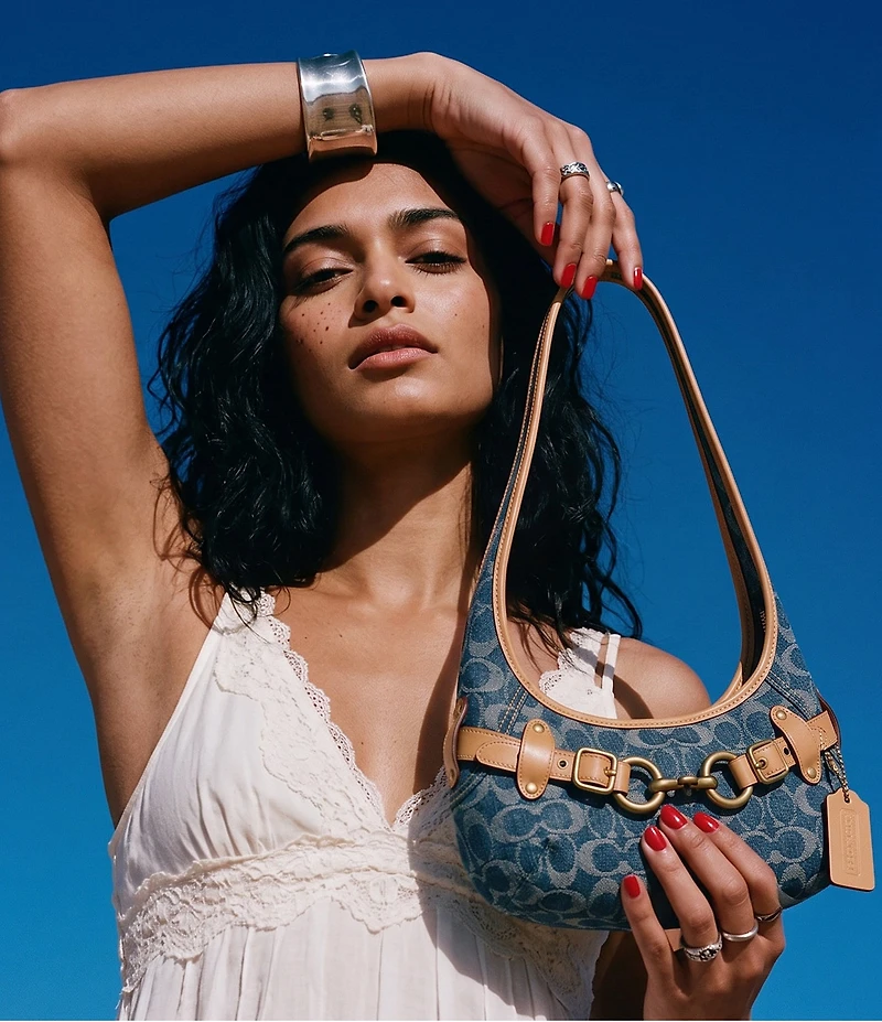 COACH Denim Signature Belted Ergo Small Shoulder Bag