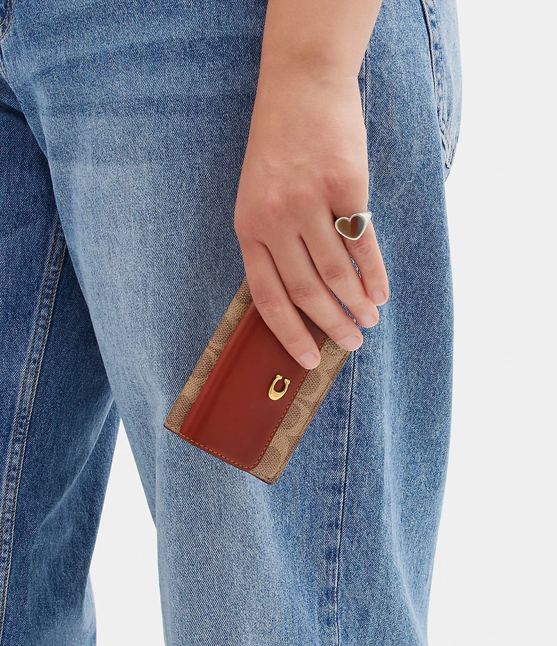 COACH Mini Signature Canvas Trifold Wallet
