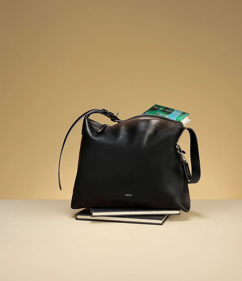 COACH Mott Loved Leather Messenger Bag