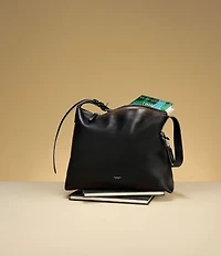 COACH Mott Loved Leather Messenger Bag