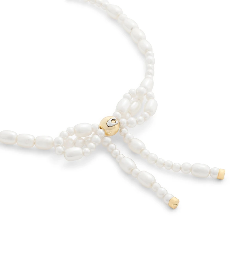 COACH Pearl Bow Strand Line Bracelet