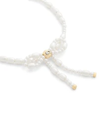 COACH Pearl Bow Strand Line Bracelet