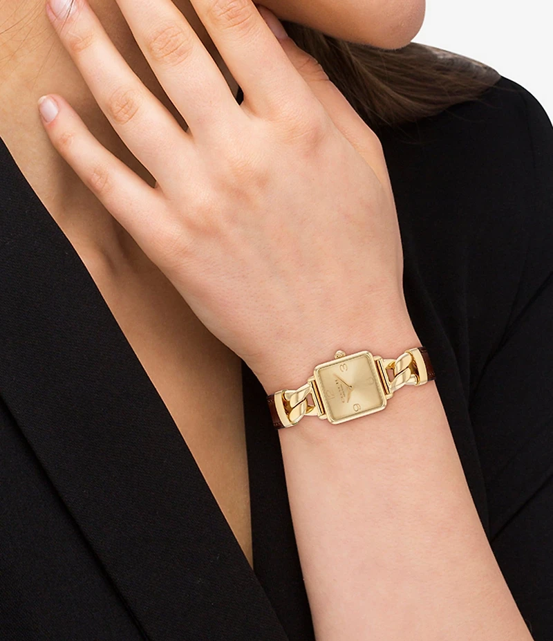 COACH Women's Cass Quartz Analog Gold Tone Stainless Steel and Saddle Leather Strap Watch