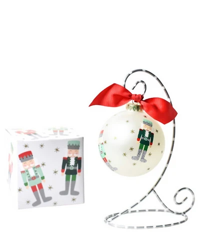Coton Colors Nutcracker Glass Ornament with Silver and White Swirl Stand Set