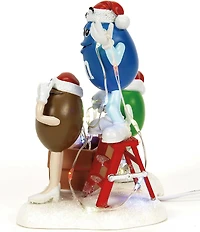 Department 56 North Pole Village Light Duty M&M's Figure