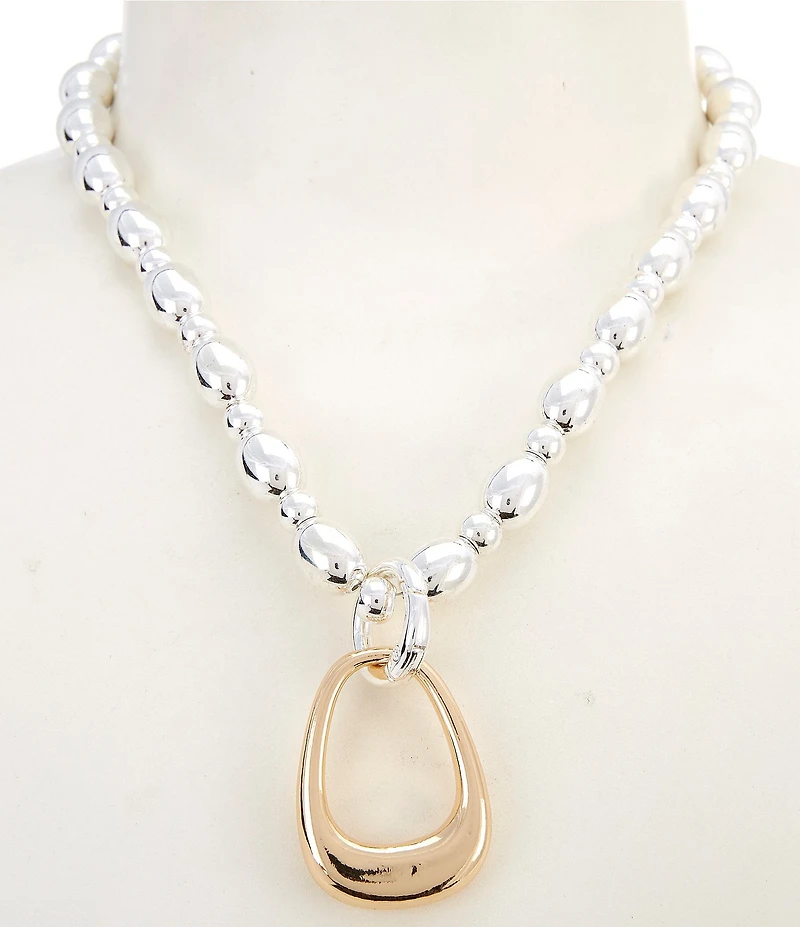 Dillard's Two-Tone Stirrup Pendant Statement Necklace