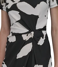 DKNY by Donna Karan Matte Jersey Floral Print Boat Neck Short Sleeve Twist Front Sheath Midi Dress