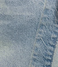 Free People Emmy Denim High Waisted Asymmetric Raw Hem Tie Side Mini Skort