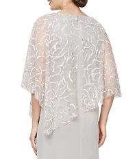 Ignite Evenings 3/4 Sleeve Asymmetrical Glitter Mesh Capelet V-Neck Jersey Gown