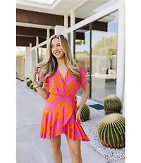 J.Marie Mara Sun Print V-Neck Short Flutter Sleeve Wrap Front Romper